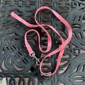 Pink leash with grey paw prints
